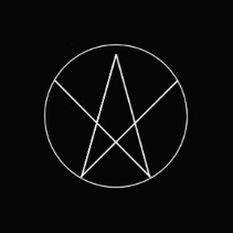 a white circle with a star inside of it on a black background