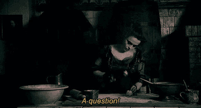 a black and white photo of a woman holding a knife and the words a question in yellow