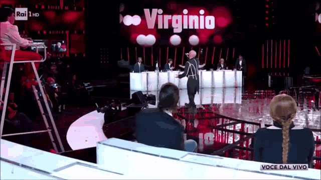 virginia is being interviewed by a group of people