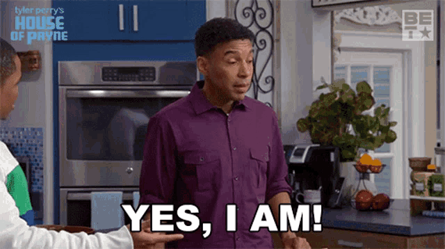 a man in a purple shirt says yes , i am