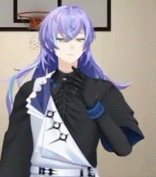 a man with long purple hair is standing in front of a basketball net .