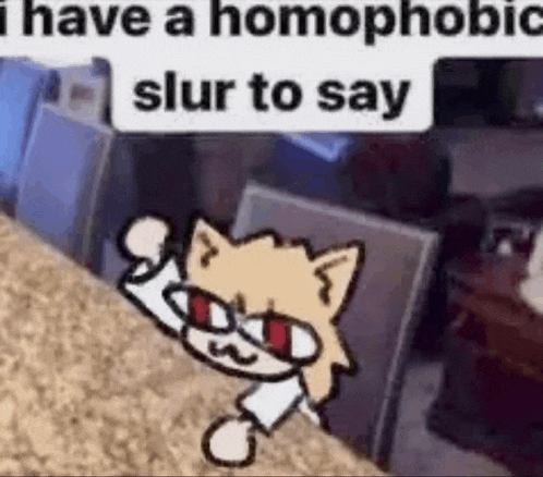 a cartoon cat is sitting on a carpet with a sign that says `` i have a homophobic slur to say ''