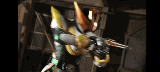 a cartoon character is holding a gun in his hand .
