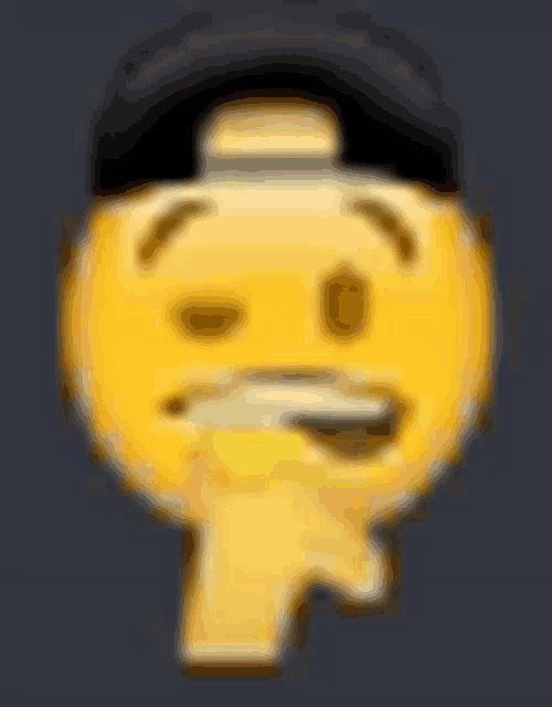 a blurry picture of an emoji wearing a hat .