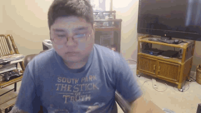 a man wearing a south park the stick of truth t-shirt