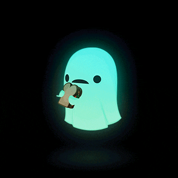 a glow in the dark ghost is eating a sandwich