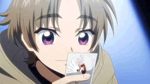 a young boy with purple eyes is holding a card in his hand