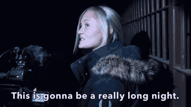 a woman in a black jacket with the words " this is gonna be a really long night "