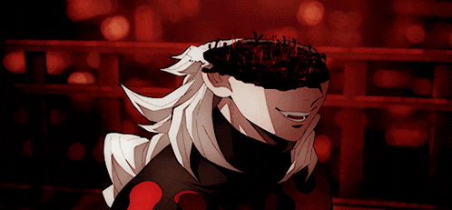 a close up of a person with red eyes and white hair