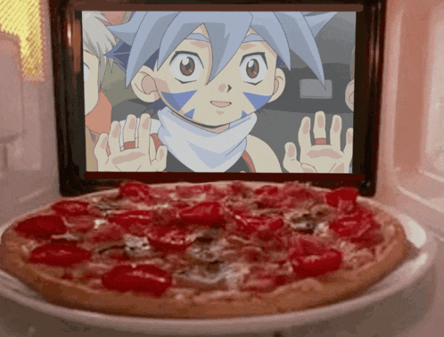 a pizza with a picture of a boy on the screen