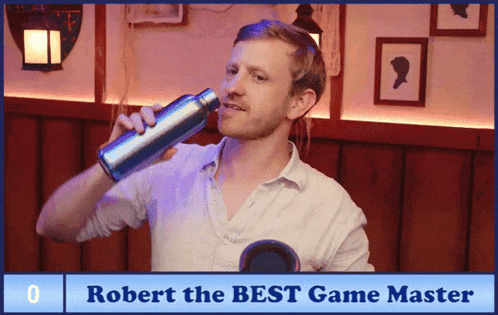 a man drinking from a blue bottle with the words " robert the best game master " on the bottom