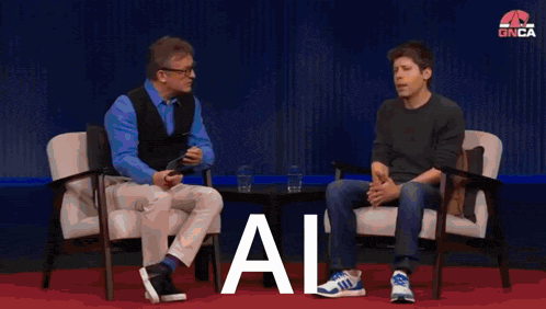 two men are sitting in chairs and the word ai is on the screen behind them