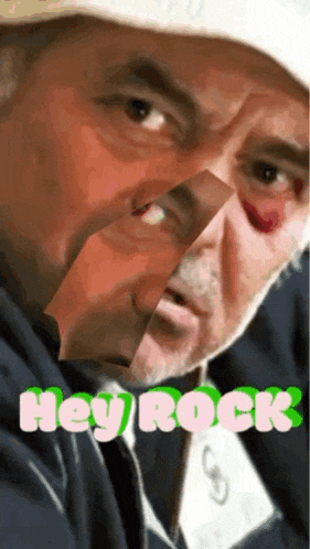 a man with a bandage on his face and the words hey rock