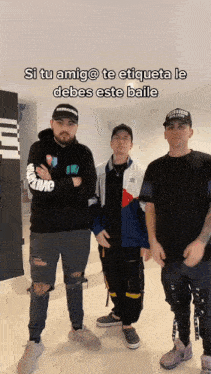 three men standing next to each other with the caption si tu amigo te etiqueta le debes este baile
