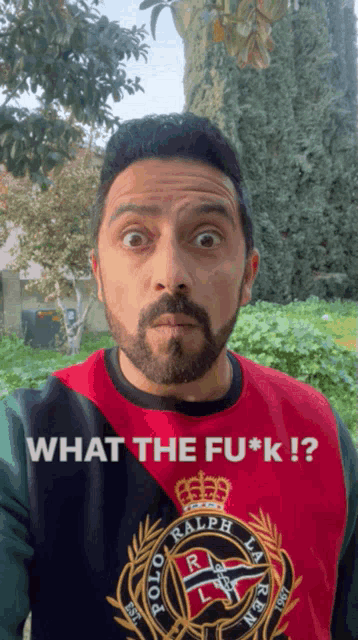 a man with a beard wearing a polo ralph lauren shirt says what the fuck