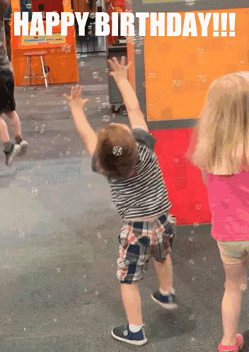 a little girl is jumping in the air with the words happy birthday written above her
