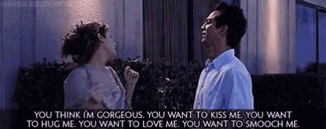 a man and a woman are standing next to each other and the man is saying you think i 'm gorgeous .