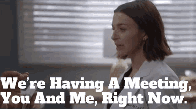a woman in a lab coat says " we 're having a meeting "