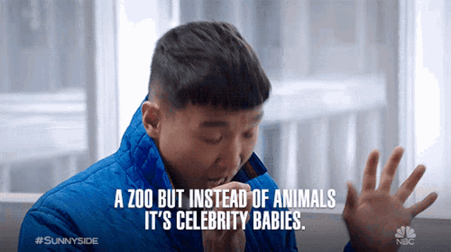 a man in a blue jacket is coughing and says " a zoo but instead of animals it 's celebrity babies "