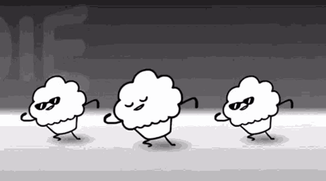 three cupcakes are dancing in front of a sign that says " die "