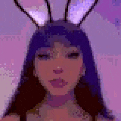 a pixel art of a woman wearing bunny ears and a choker .