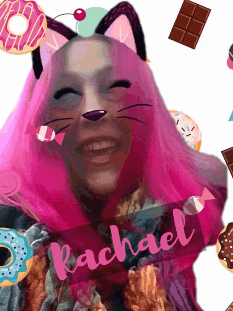 a woman with pink hair has a cat face and the name rachael on her chest