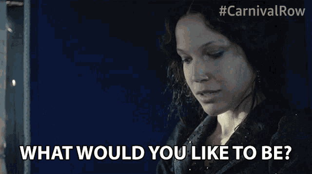 a woman says " what would you like to be " while smiling