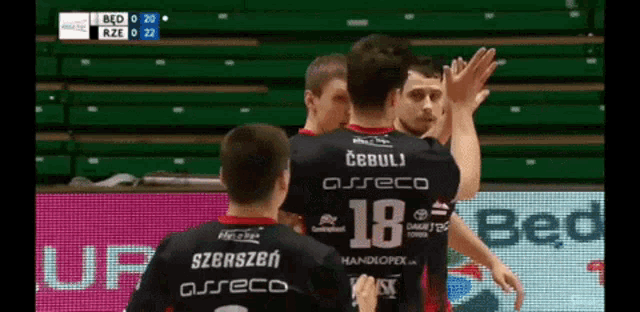 the number 18 is on the back of a player 's shirt