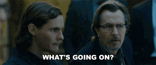 two men looking at each other with the words " what 's going on " written below them