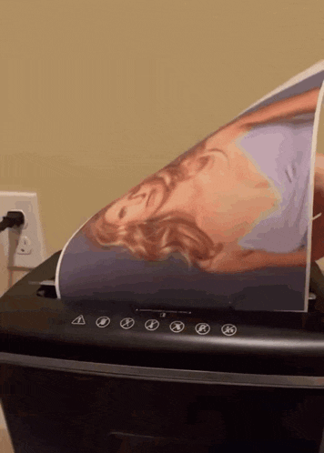 a paper shredder with a picture of a woman on it