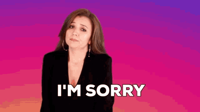 a woman in a black jacket is saying i 'm sorry on a pink and purple background .