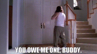 a man standing in a hallway with the words you owe me one buddy on the bottom