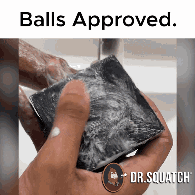 a picture of a person holding a bar of soap with the words balls approved