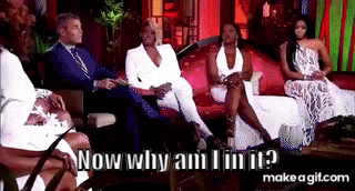a group of people are sitting on a couch and one of them is asking why they are sitting there .