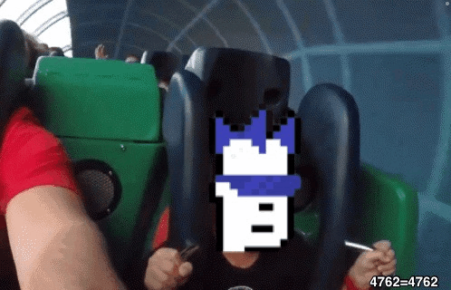 a person is riding a roller coaster with a pixelated image of a castle behind them