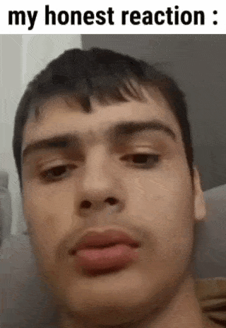 a close up of a man 's face with a caption that says `` my honest reaction : '' .