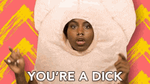 a woman in a popcorn costume is saying you 're a dick