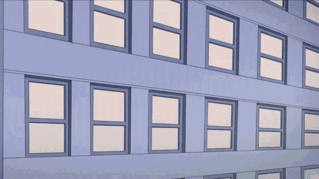 a building with a lot of windows and a reflection of the windows