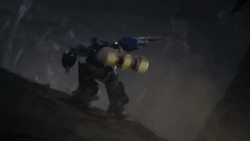 a group of robots are fighting each other in a dark room