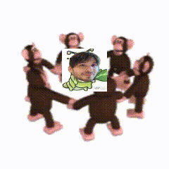 a group of stuffed monkeys are dancing around a picture of a man with a green caterpillar on his head