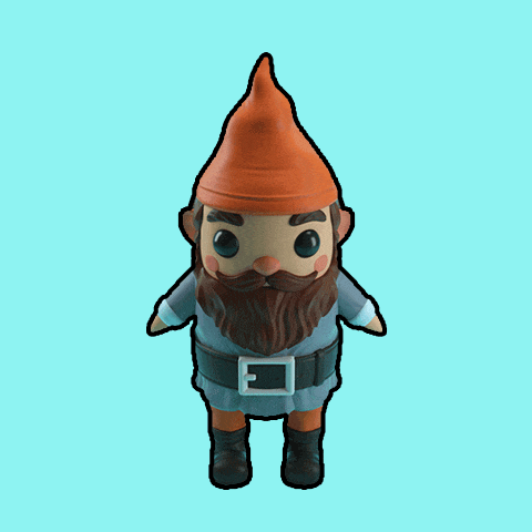 a figurine of a gnome with an orange hat