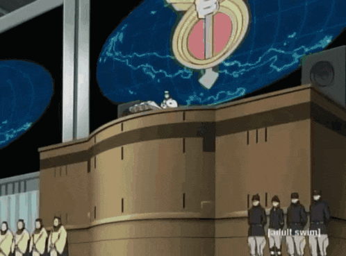 a group of people standing in front of a podium that says adult swim on it