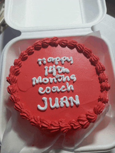 a cake that says happy 14th months coach juan on it