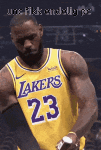 a basketball player wearing a lakers jersey number 23