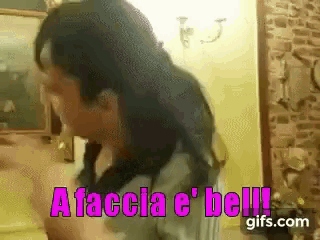 a gif of a woman with the words " a faccia e ' bell " on it