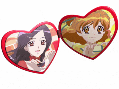 a heart shaped picture frame with two anime girls inside