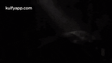 a black and white photo of a bed with the words kulfyapp.com at the top