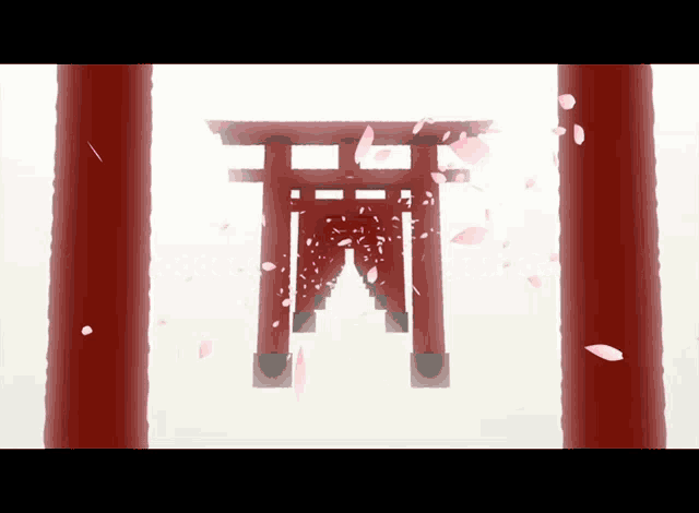 a red torii gate with cherry blossoms falling from it