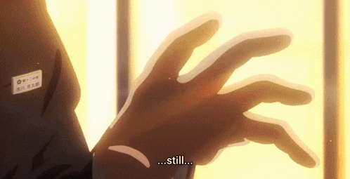 a close up of a person 's hand with a label on it that says still .