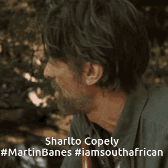 a picture of a man with the name sharlto copely